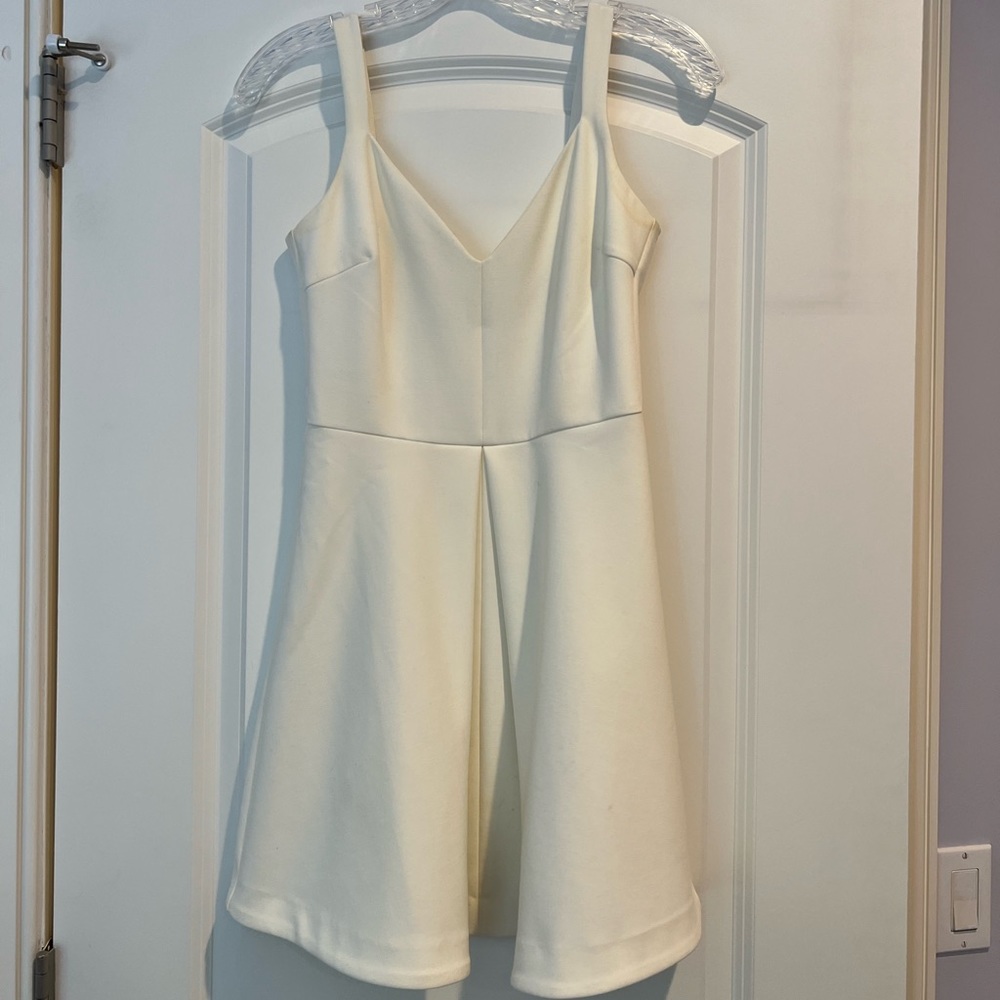 Likely white dress